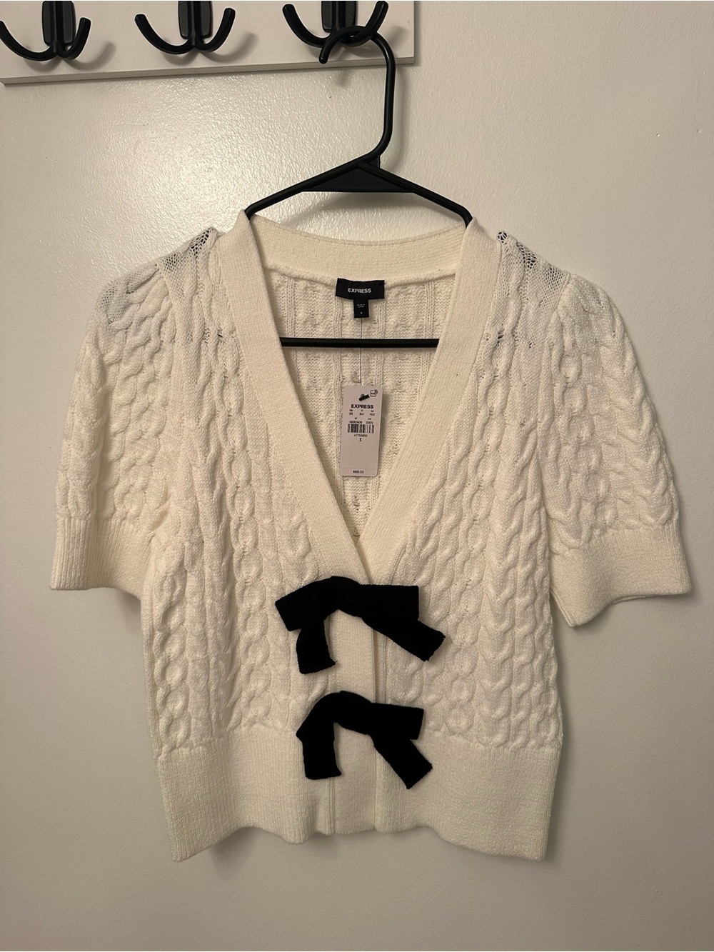Express Cream Cable-Knit Short Sleeve Cardigan with Black Bow Closures
